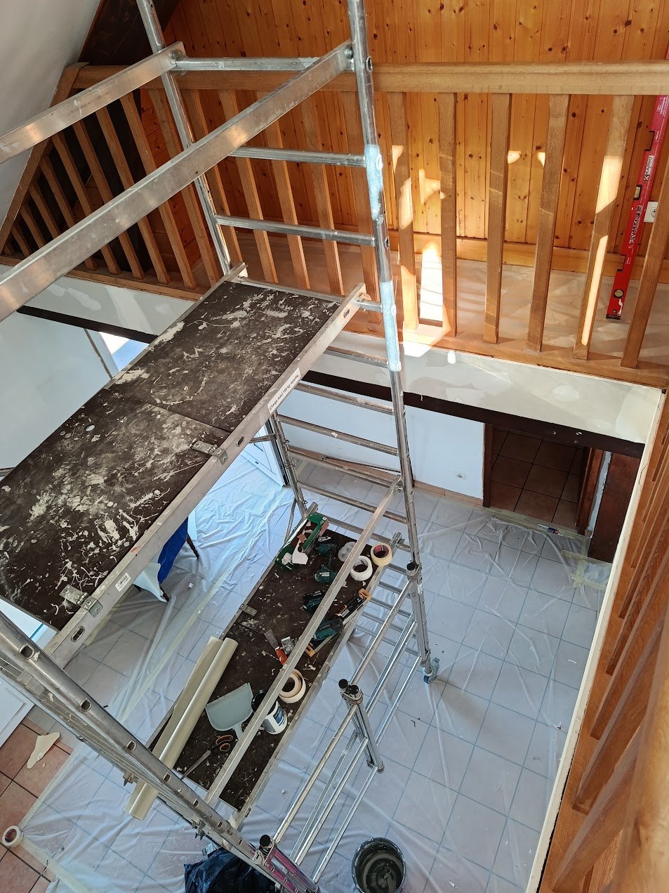 Travaux de plâtrerie en grande hauteur